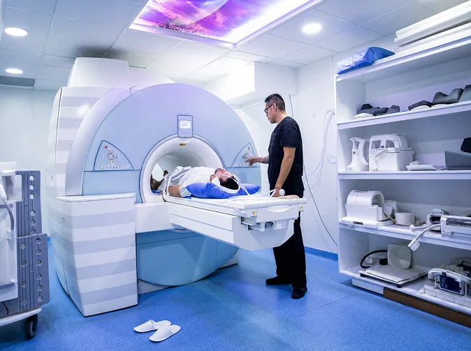 A radiologist reviewing diagnostic images in the reading room at Lucent Medical Imaging in Glendale